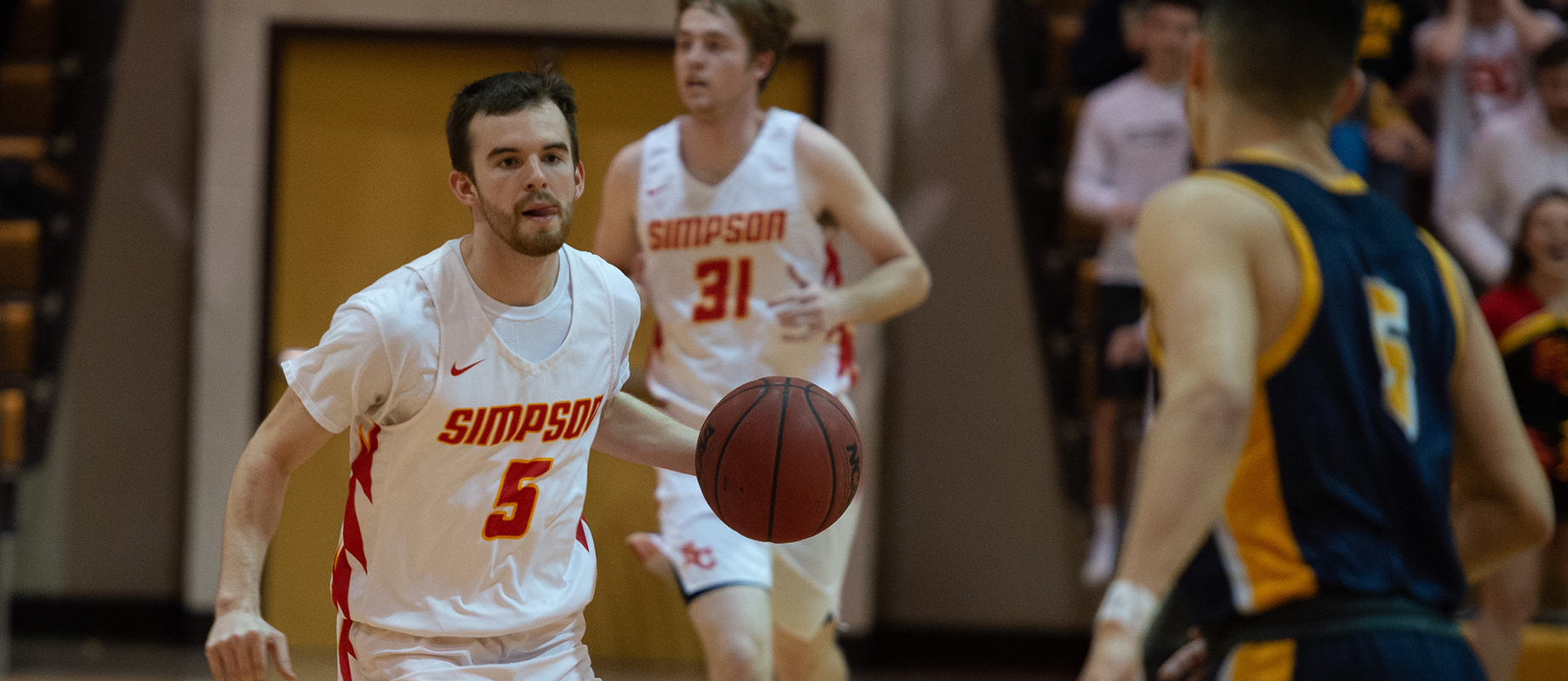 Nick Janssen as a member of the Simpson College basketball team.